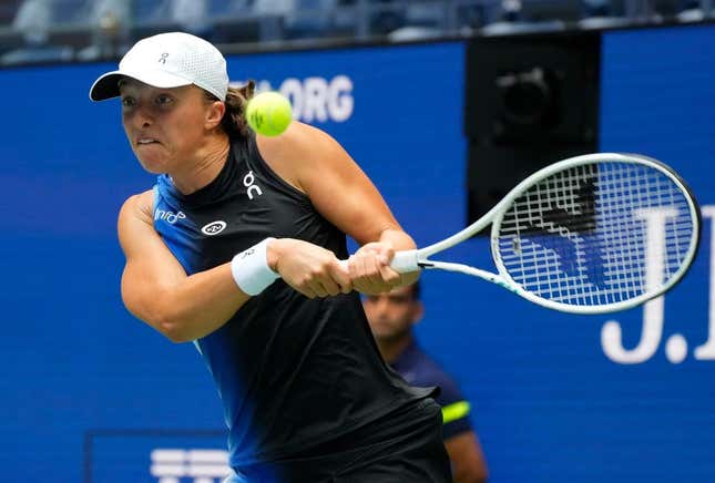Aug 28, 2023; Flushing, NY, USA; Iga Swiatek of Poland hits to Rebecca Peterson of Sweden on day one of the 2023 U.S. Open tennis tournament at USTA Billie Jean King National Tennis Center.