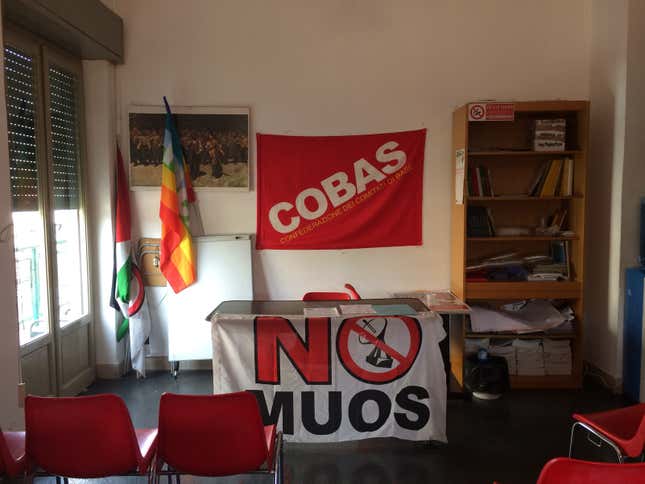 In a union office in Palermo, an empty room awaits a No MUOS press conference.