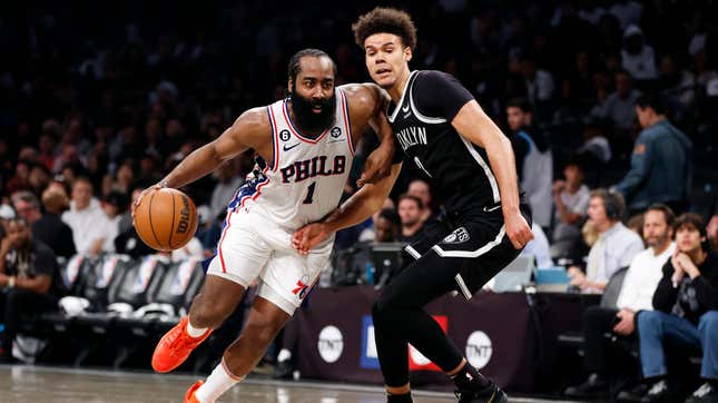 James Harden dribbles against Cameron Johnson during the second half of Game Four of the Eastern Conference First Round Playoffs at Barclays Center.