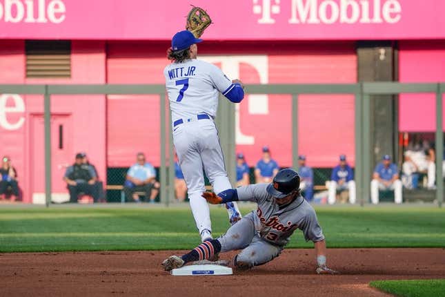 May 22, 2023; Kansas City, Missouri, USA; Kansas City Royals shortstop Bobby Witt Jr. (7) can t make the tag as Detroit Tigers second baseman Zach McKinstry (39) reaches second base in the first inning at Kauffman Stadium.