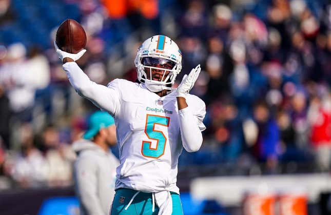 Jan 1, 2023; Foxborough, Massachusetts, USA; Miami Dolphins quarterback Teddy Bridgewater (5) warms up before the start of the game against the New England Patriots at Gillette Stadium.