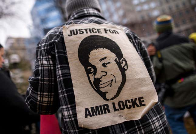 MINNEAPOLIS, MN - APRIL 06: A person wears a portrait of Amir Locke outside the Hennepin County Government Center on April 6, 2022 in Minneapolis, Minnesota. 