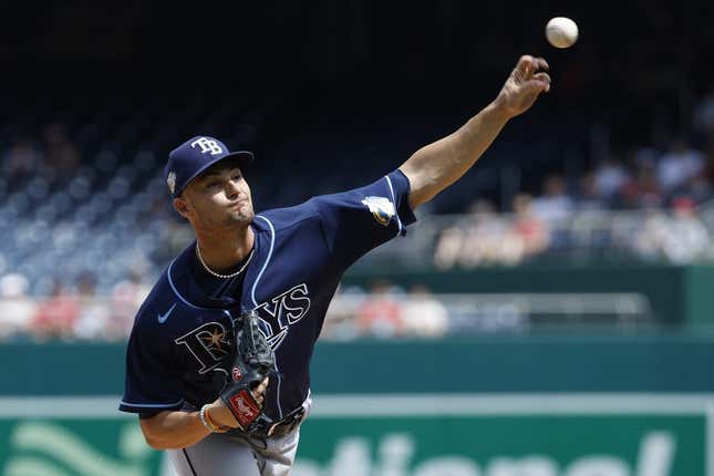 Apr 5, 2023; Washington, District of Columbia, USA; Tampa Bay Rays starting pitcher Shane McClanahan (18) pitches against the Washington Nationals during the first inning at Nationals Park.