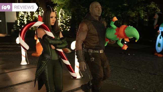 the characters holding christmas decorations