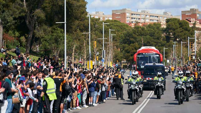 Barcelona police escort the teams in the Kings League finals to Camp Nou.