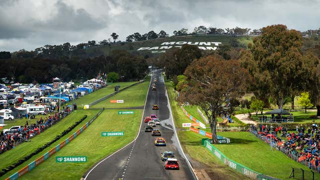 A photo of cars racing in the Bathurst 1000. 