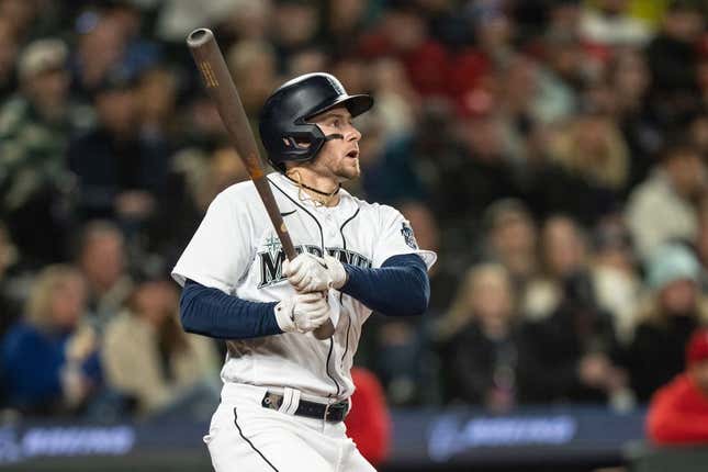 Apr 22, 2023; Seattle, Washington, USA; Seattle Mariners left fielder Jarred Kelenic (10) hits a double against the St. Louis Cardinals at T-Mobile Park.