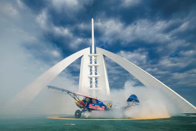 Image for article titled Stunt Pilot Lands Airplane on the World's Shortest Runway, a Helipad