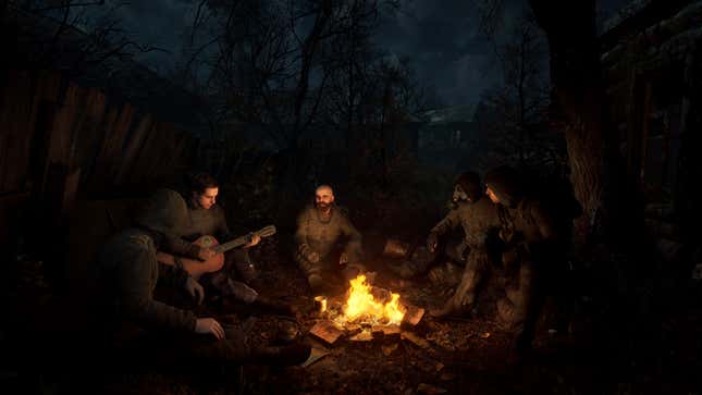 A bunch of survivors sit around a campfire in Stalker 2.