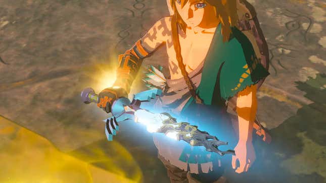 Link is seen holding a damaged Master Sword.