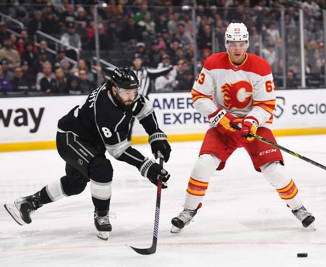 Mar 20, 2023; Los Angeles, California, USA; Los Angeles Kings defenseman Drew Doughty (8) passes the puck during first period against Calgary Flames center Adam Ruzicka (63) at Crypto.com Arena.