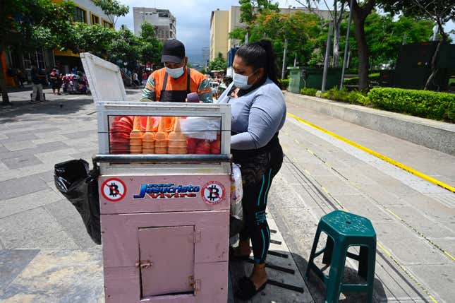 View of stickers against bitcoin in an ice cream vendor’s cart in San Salvador on September 1, 2021. 