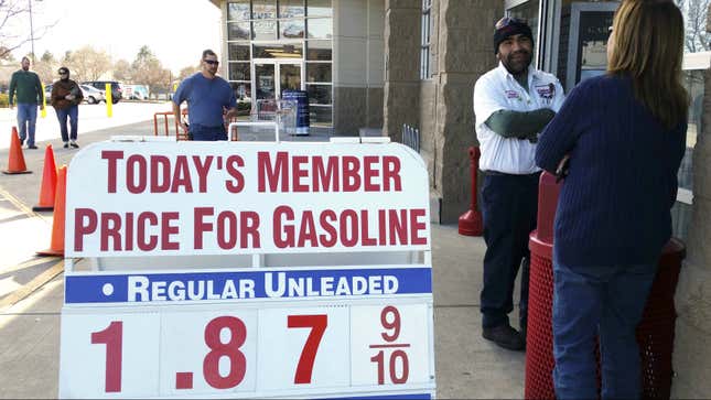The price sign outside the Costco in Westminster, Colorado shows gas selling for below $1.90 for the first time in years December 20, 2014.