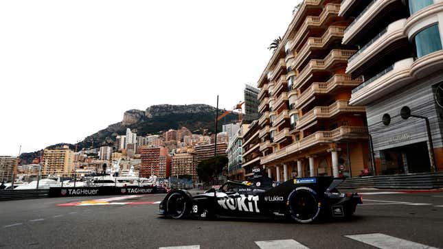 A photo of a black Rokit Venture race car in Monaco.