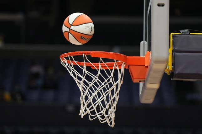 May 25, 2023; Los Angeles, California, USA; Wilson official basketball with WNBA logo goes through the net during the game between the LA Sparks and the Las Vegas Aces at Crypto.com Arena.