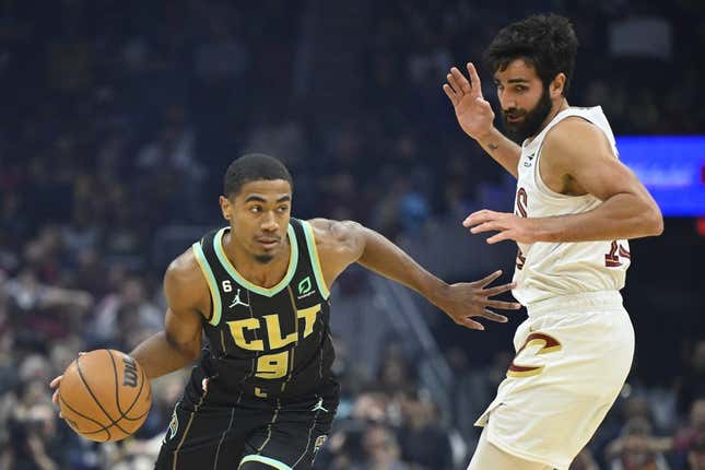 Apr 9, 2023; Cleveland, Ohio, USA; Charlotte Hornets guard Theo Maledon (9) drives beside Cleveland Cavaliers guard Ricky Rubio (13) in the first quarter at Rocket Mortgage FieldHouse.