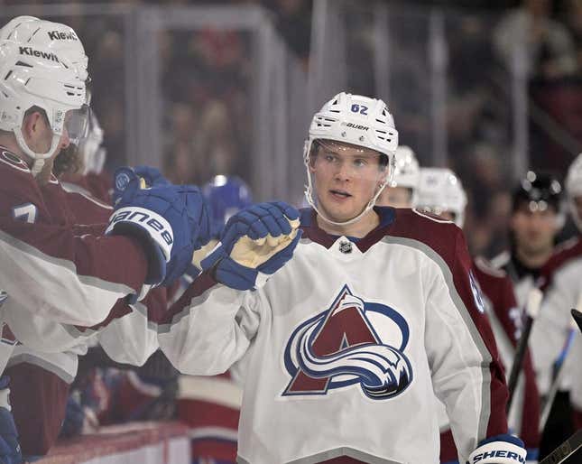Mar 13, 2023; Montreal, Quebec, CAN; Colorado Avalanche forward Artturi Lehkonen (62) celebrates with teammates after scoring a goal against the Montreal Canadiens during the first period at the Bell Centre.