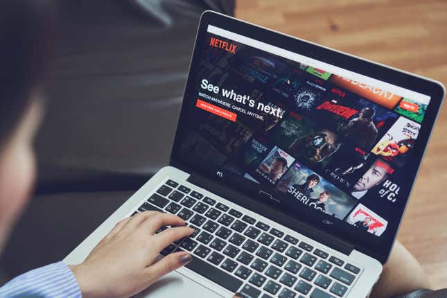 Stock image of laptop screen displaying Netflix homepage.