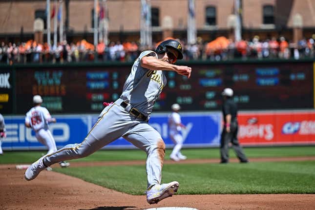 May 14, 2023; Baltimore, Maryland, USA; Pittsburgh Pirates left fielder Bryan Reynolds (10) rounds third base to score during the third inning against the Baltimore Orioles at Oriole Park at Camden Yards.