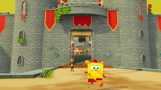 Spongebob runs toward the camera in a jester outfit with a castle behind him.