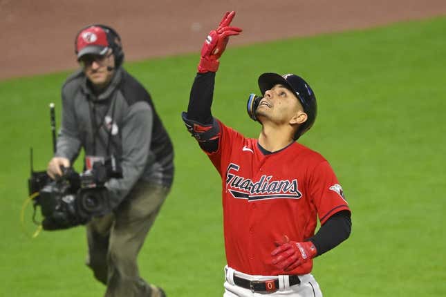 May 13, 2023; Cleveland, Ohio, USA; Cleveland Guardians second baseman Andres Gimenez (0) celebrates his solo home run in the eighth inning against the Los Angeles Angels at Progressive Field.