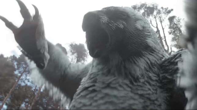 An owlbear rears up and roars menacingly.