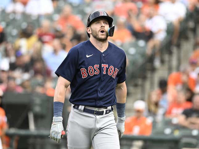 Sep 10, 2022; Baltimore, Maryland, USA;  Boston Red Sox second baseman Trevor Story (10) reacts to being hit by a pitch during the first inning against the Baltimore Orioles at Oriole Park at Camden Yards.
