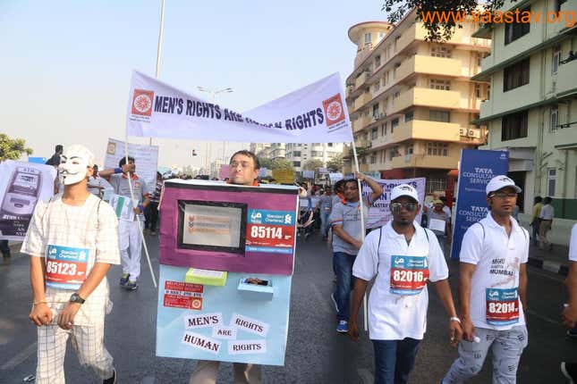 Image for article titled Some Indian men are running marathons dressed as ATM machines