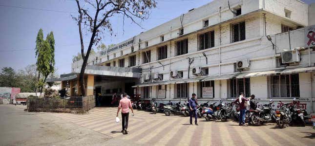 A man walks outside Ahmednagar Civil Hospital.