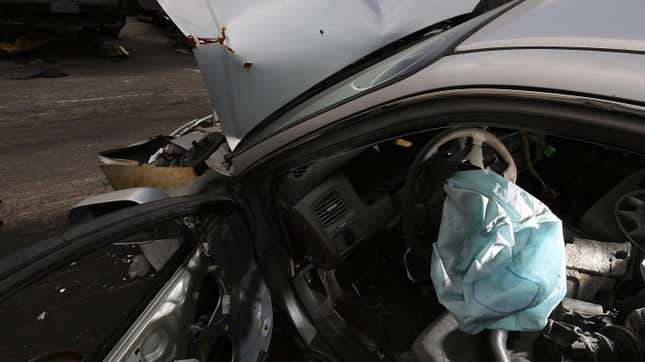 MEDLEY, FL - MAY 22: A deployed airbag is seen in a 2001 Honda Accord at the LKQ Pick Your Part salvage yard on May 22, 2015 in Medley, Florida. The largest automotive recall in history centers around the defective Takata Corp. air bags that are found in millions of vehicles that are manufactured by BMW, Chrysler, Daimler Trucks, Ford, General Motors, Honda, Mazda, Mitsubishi, Nissan, Subaru and Toyota. 
