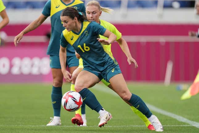 Jul 24, 2021; Saitama, Japan; Australia player Hayley Raso (16) moves the ball agains Sweden player Jonna Andersson (2) during the Tokyo 2020 Olympic Summer Games at Saitama Stadium.