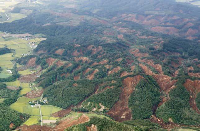 Landslides caused by an earthquake are seen in Atsuma town in Hokkaido.