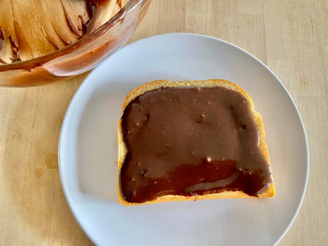 Brownie batter on toast before baking.