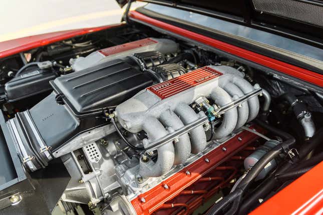 Engine bay of red Ferrari Testarossa Pininfarina Spider "Special Production."