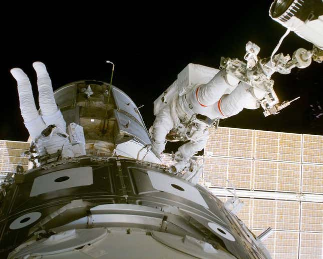 NASA astronauts Jerry Ross and James Newman performing the very first EVA at ISS in 1998.