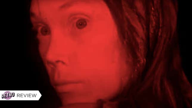 A red-toned image of Sissy Spacek as Carrie White in the horror movie Carrie.