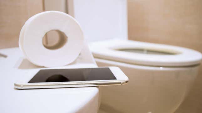 Image for article titled Your Bathroom Needs a Phone Shelf