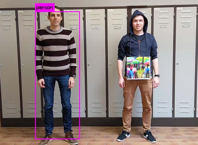 The results of an image recognition scan. The man on the left is identified as a person, while the man on the right is not. 
