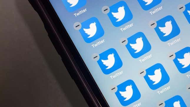A phone filed with icons for the Twitter app, with the delete button hovering over all of them.