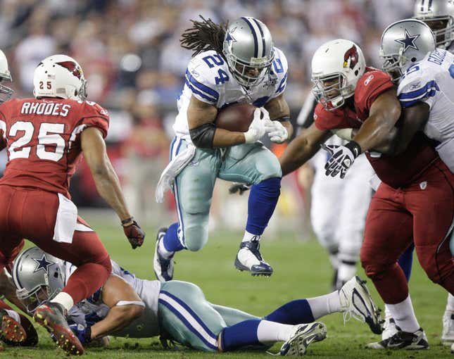 Dallas Cowboys running back Marion Barber III (24) runs in for a touchdown against the Arizona Cardinals during the third quarter of an NFL football game Dec. 25, 2010, in Glendale, Ariz. Barber, who scored plenty of touchdowns without recording a 1,000-yard season, has died, the team said Wednesday, June 1, 2022. He was 38. Barber played a final season with Chicago in 2011 after spending his first six years with the Cowboys.
