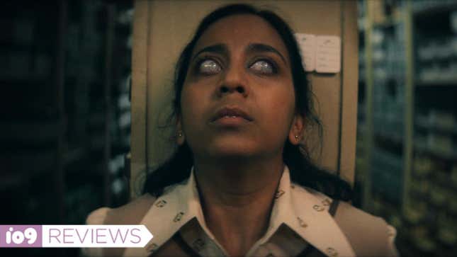 A woman with cloudy eyes looks up as if possessed