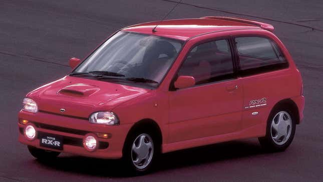 A photo of a red Subaru Vivio RX-R hatchback. 