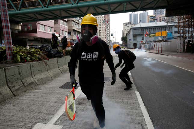 A protester sports a “Freedom Hi” t-shirt.