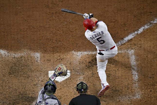 May 20, 2023;  Arlington, Texas, USA;  Texas Rangers shortstop Corey Seager (5) hit a home run and drove in two runs during the sixth inning at Globe Life Field against the Colorado Rockies.