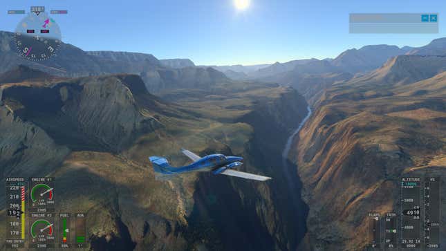 a plane flying over the grand canyon in microsoft flight sim