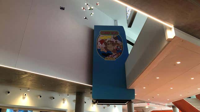 The Strong Museum's massive Donkey Kong arcade game sits between a wall and the second floor.