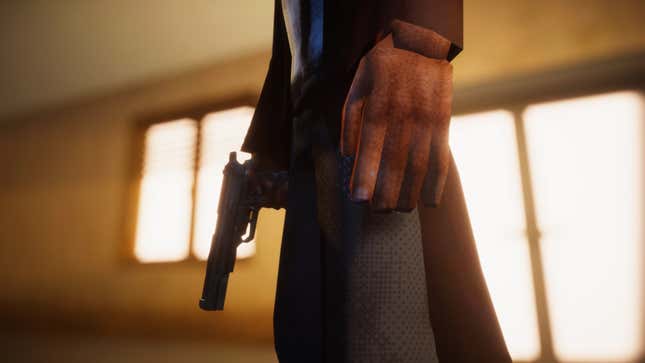 A man holds a gun in a motel room. 