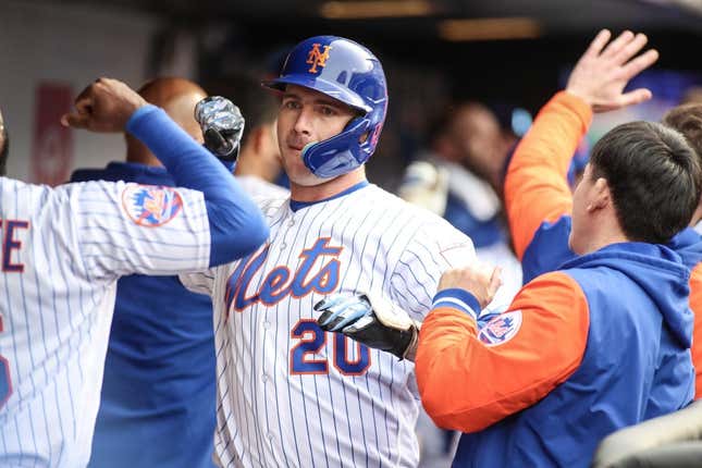 Apr 8, 2023; New York City, New York, USA;  New York Mets first baseman Pete Alonso (20) celebrates with his teammates after hitting a two run home run in the fifth inning against the Miami Marlins at Citi Field.