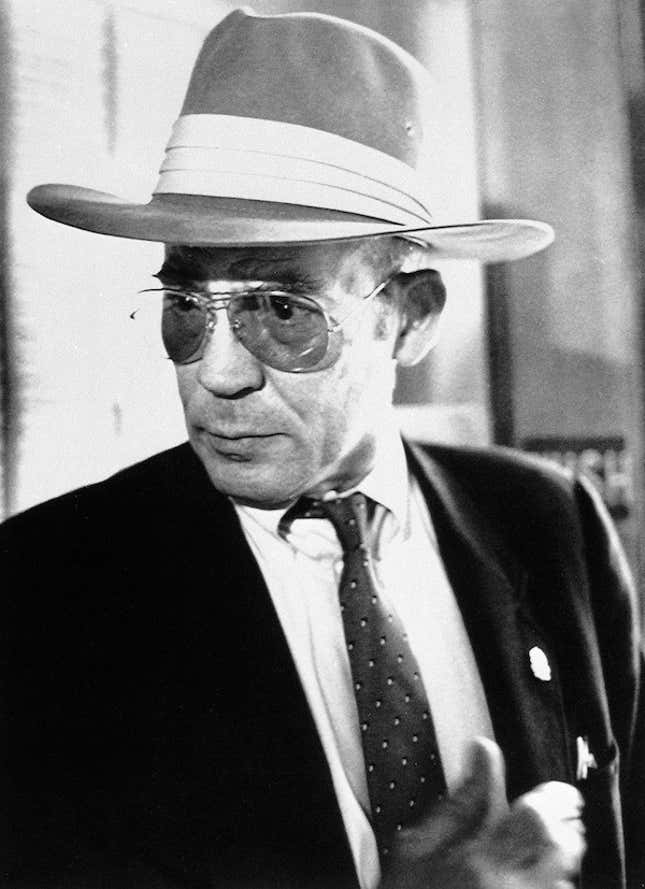 Author Hunter S. Thompson talks to reporters as he leaves a courtroom at the Pitkin County Courthouse in Aspen, Colo., Monday, April 10, 1990. (AP Photo/Frank Martin)