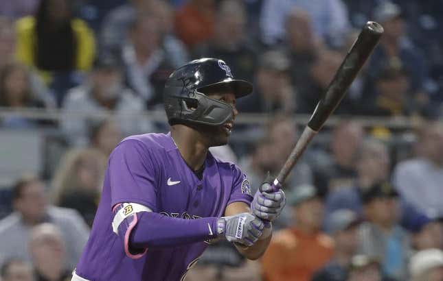 May 9, 2023; Pittsburgh, Pennsylvania, USA;  Colorado Rockies left fielder Jurickson Profar (29) hits a two run home run against the Pittsburgh Pirates during the seventh inning at PNC Park.